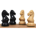 Black ebonised and white boxwood Majestic Series Staunton knight chess pieces facing each other.
