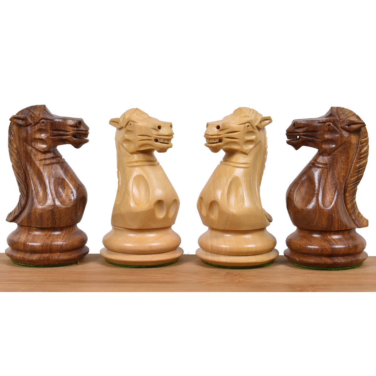 Detailed view of Golden Rosewood and boxwood chess knights.