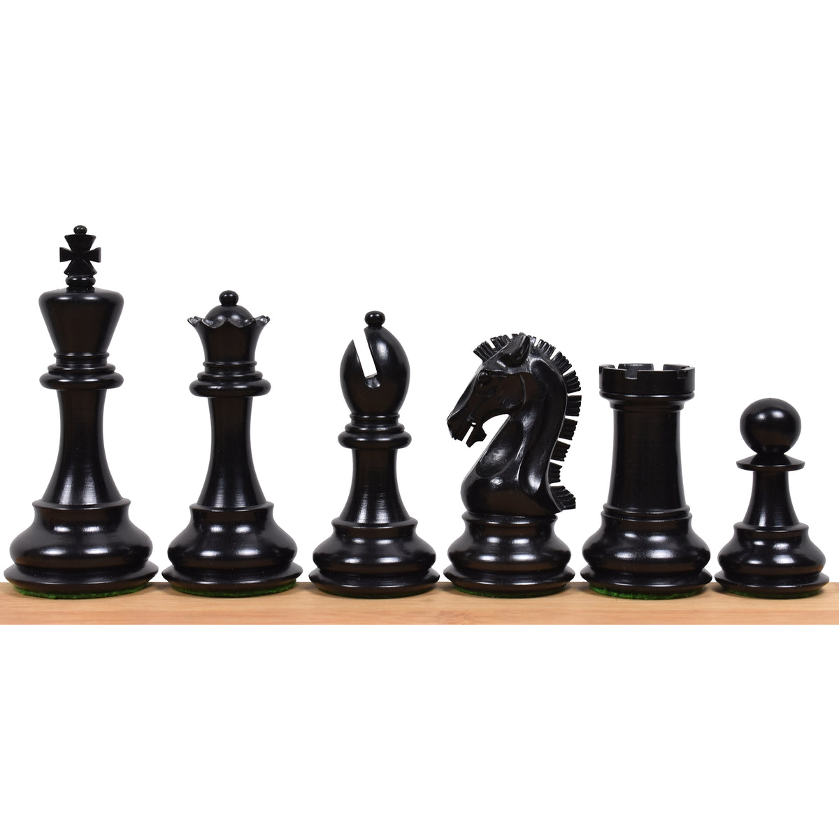 Individual black ebony wood chess pieces from the 3.9" Craftsman set.