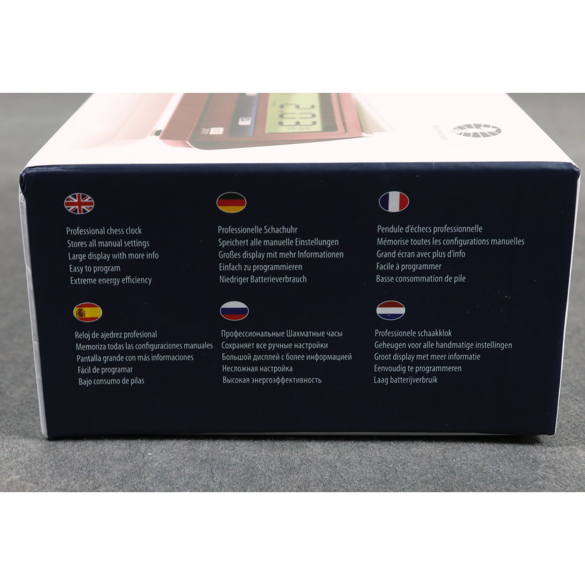 Side panel of the DGT 2010 chess clock box detailing product specifications in multiple languages.