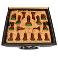 Dark wood chess pieces stored in a luxury velvet-lined black leatherette box.