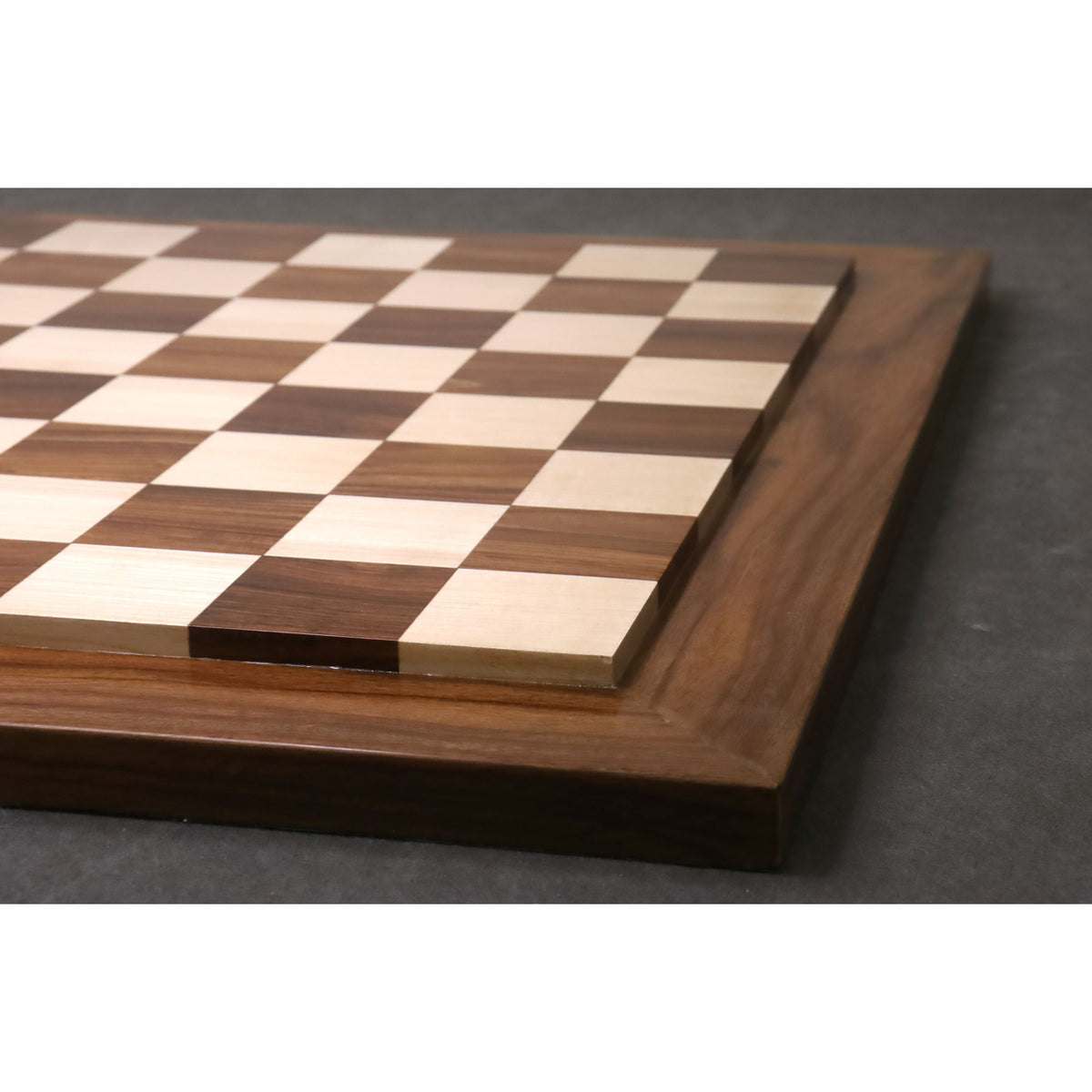 Side profile shot highlighting the raised playing platform of the Golden Rosewood and Maple wooden chess board.