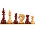 Alternating dark bud rosewood and light boxwood Staunton chess pieces.
