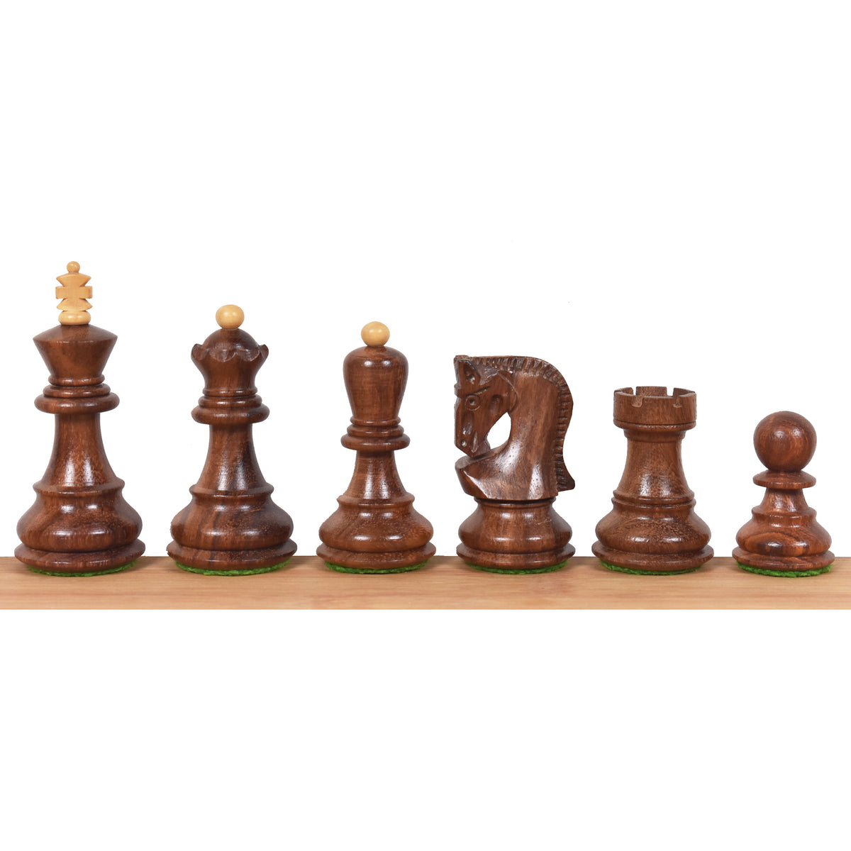 Weighted Golden Rosewood chess pieces in the Russian Zagreb style lined up against white.