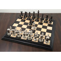 1849 Jacques Staunton luxury brass chess pieces arranged fully on a sleek black and wood chess board.