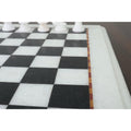 Detailed view of the 12-inch marble stone chess board square pattern.
