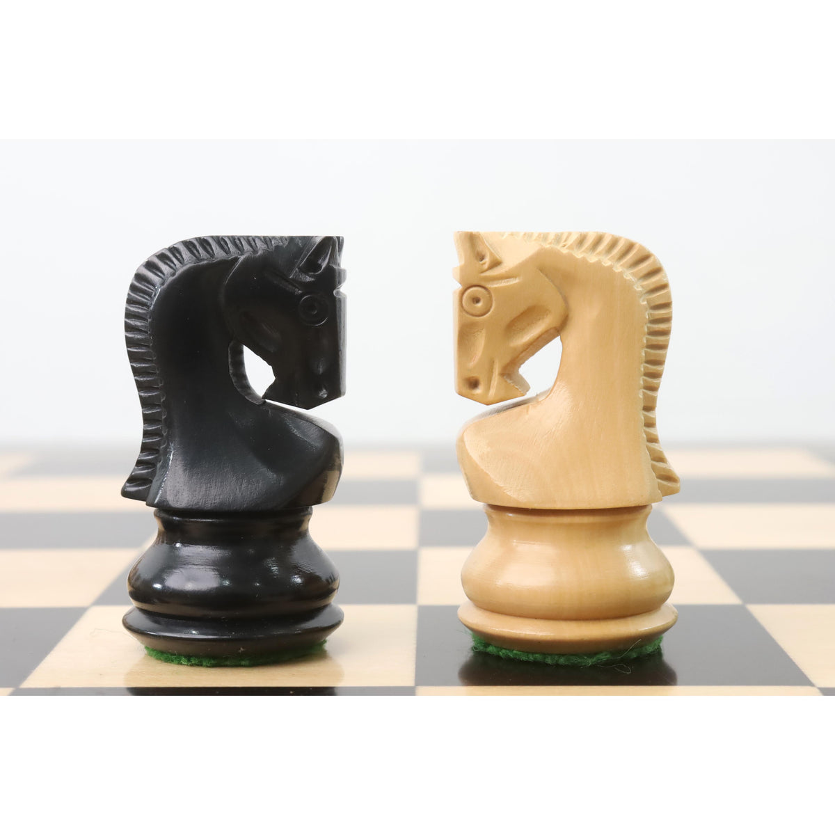 Profile view of the signature Zagreb knight with detailed hand-carved manes in contrasting wood colors.