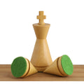 Natural boxwood King and Pawns showing the high-quality green felt base for smooth movement.