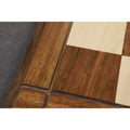 Extreme close-up of the natural wood grain and precision joinery on the Golden Rosewood and Maple chess board.