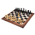 Complete 4 inch Majestic Series Staunton chess set in ebonised boxwood set up on a luxury board.