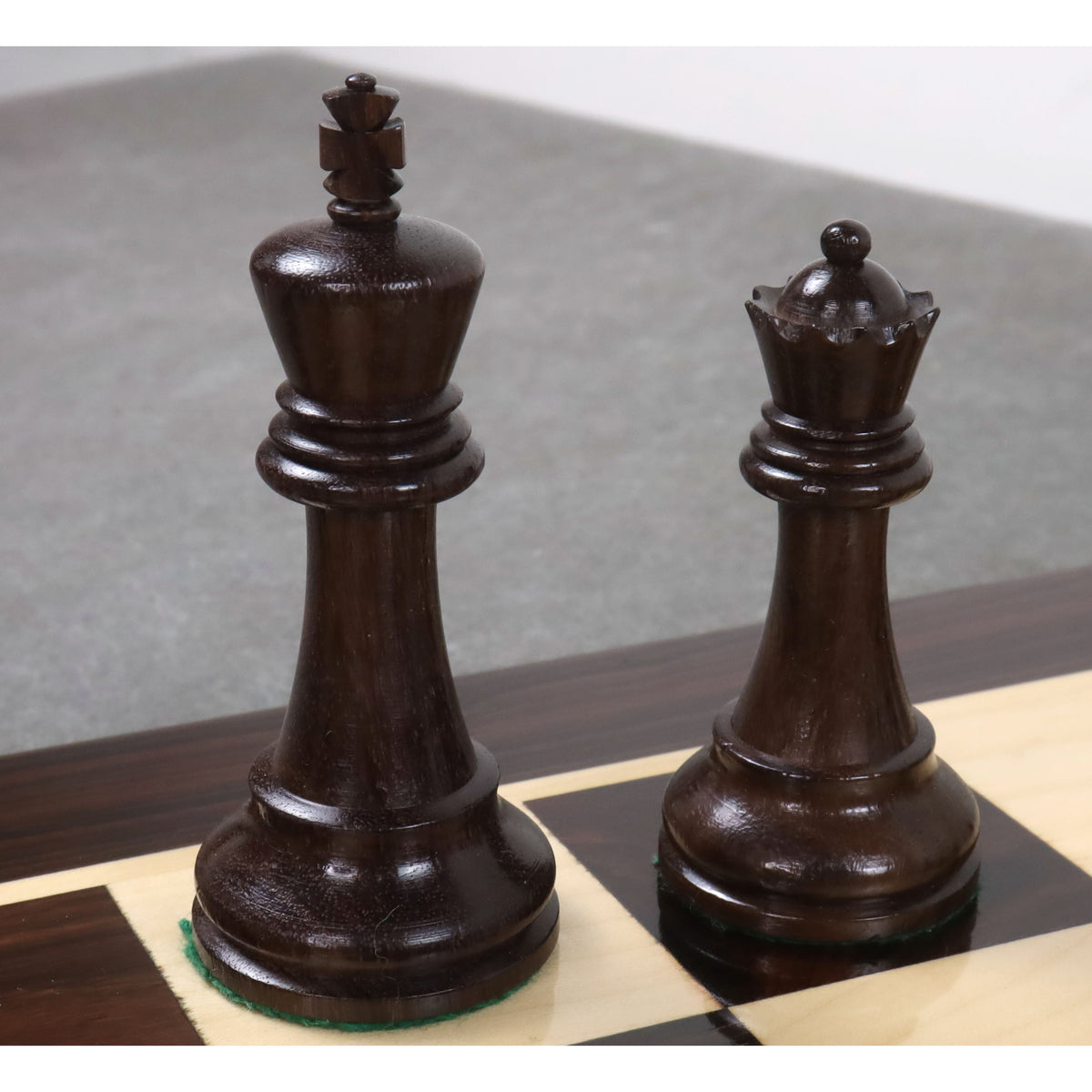 Hand-carved rosewood King and Queen pieces from the Leningrad Staunton set.