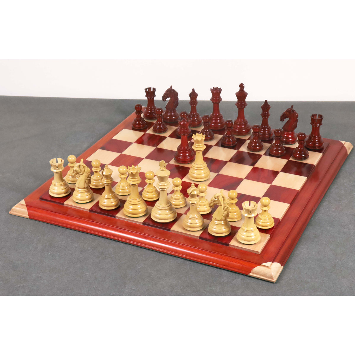 Full 4.6 inch Columbian luxury chess set arranged on a wooden board ready for play.