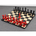 A high-angle view of a chess game in progress with red and white Pro Staunton pieces on an ebony and maple board.