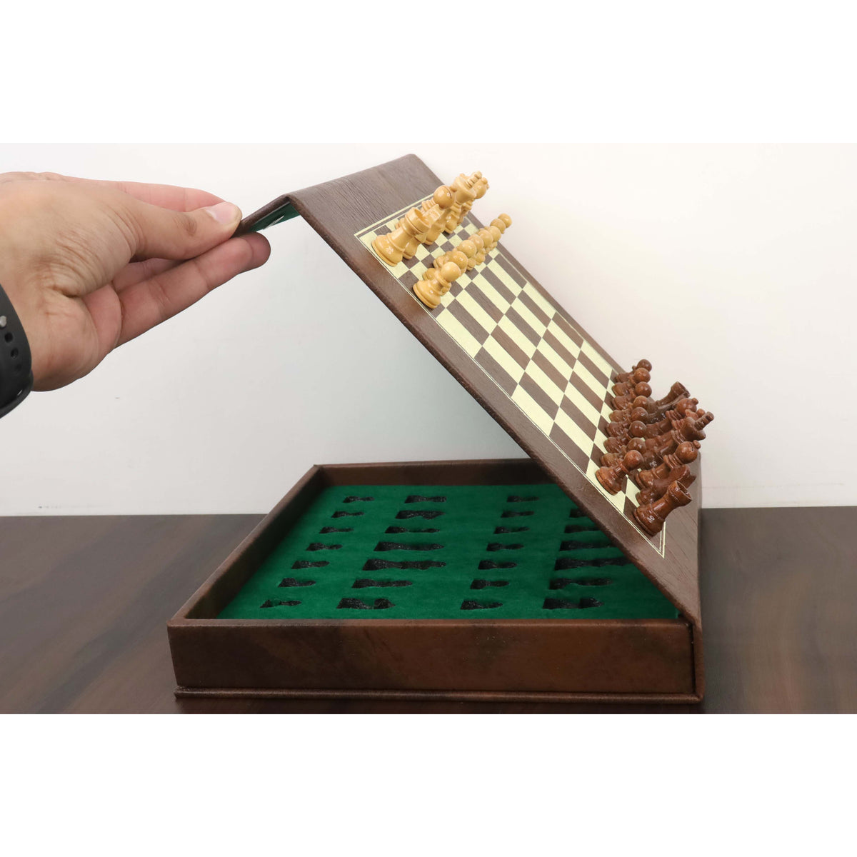 Hand lifting board of 10-inch magnetic travel chess set.