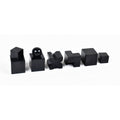 Angled front view of ebonised boxwood Bauhaus abstract chess pieces.