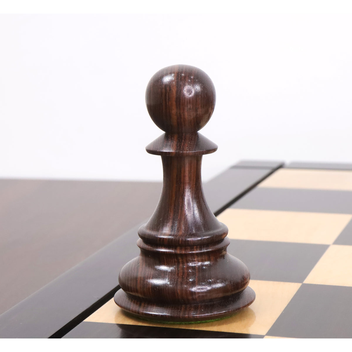 Single dark rosewood pawn from the 6.1-inch Mammoth Staunton chess set.
