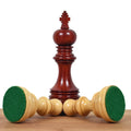 Dark bud rosewood Staunton King chess piece with light pieces.
