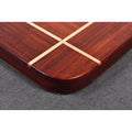 Polished rounded corner of a high-end luxury wooden chess board.