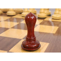 A single bud rosewood pawn chess piece from the luxury Avant Garde collection.