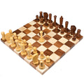 Full 3.9 inch Berliner modern minimalist chess set arranged on a wooden chess board.