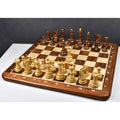 Full Russian Zagreb chess pieces set set up on a luxury wooden board for a match.