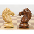 Boxwood and golden rosewood Alban Knight Staunton chess piece knights facing head-to-head.