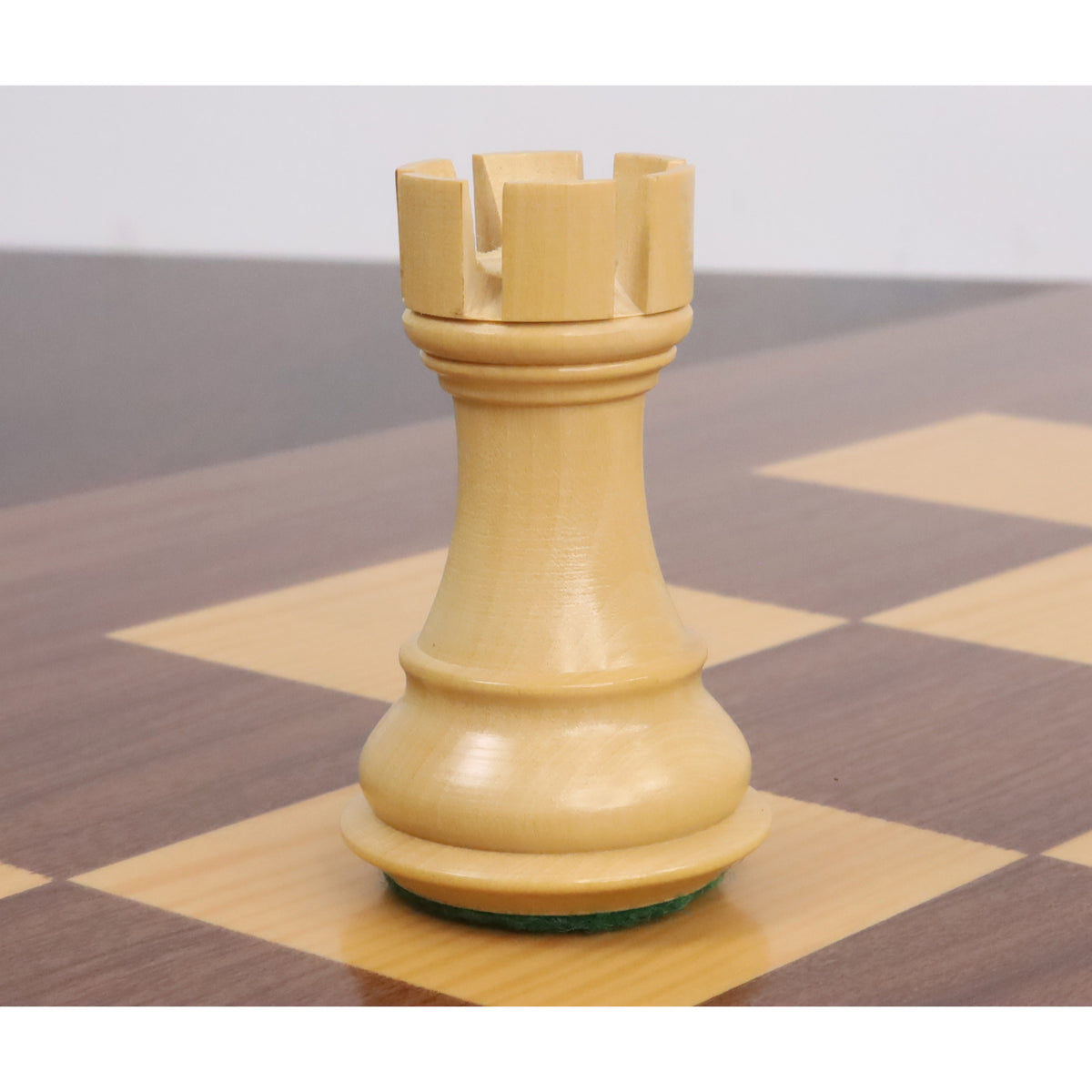 Classic boxwood rook piece from the 4 inch Bridle Staunton luxury chess pieces collection.