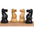 Detailed hand-carved Lessing series Staunton chess knights in polished ebony and natural boxwood.