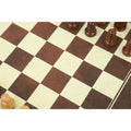 Close-up of the textured board surface on 10-inch travel chess set.