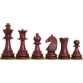 Mahogany stained French Chavet tournament chess pieces row.