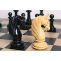 Close-up of ebony and boxwood knight chess pieces in a match position.