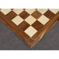 High-angle view of the large 23 inch wooden chess board highlighting the 60mm square size and polished finish.