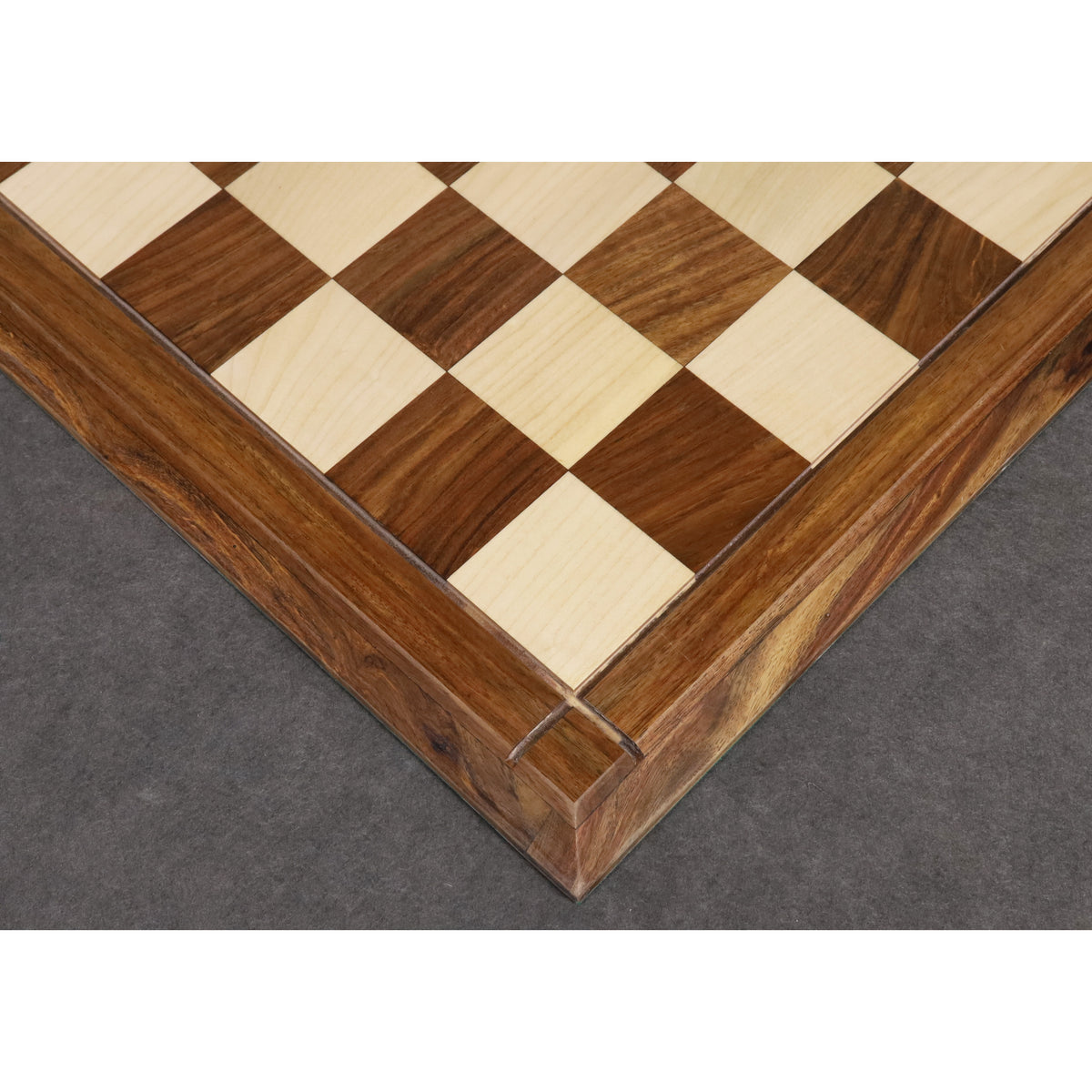 High-angle view of the large 23 inch wooden chess board highlighting the 60mm square size and polished finish.