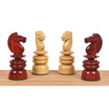 Hand-carved bud rosewood and boxwood knight pieces from the Calvert Pre-Staunton chess set.