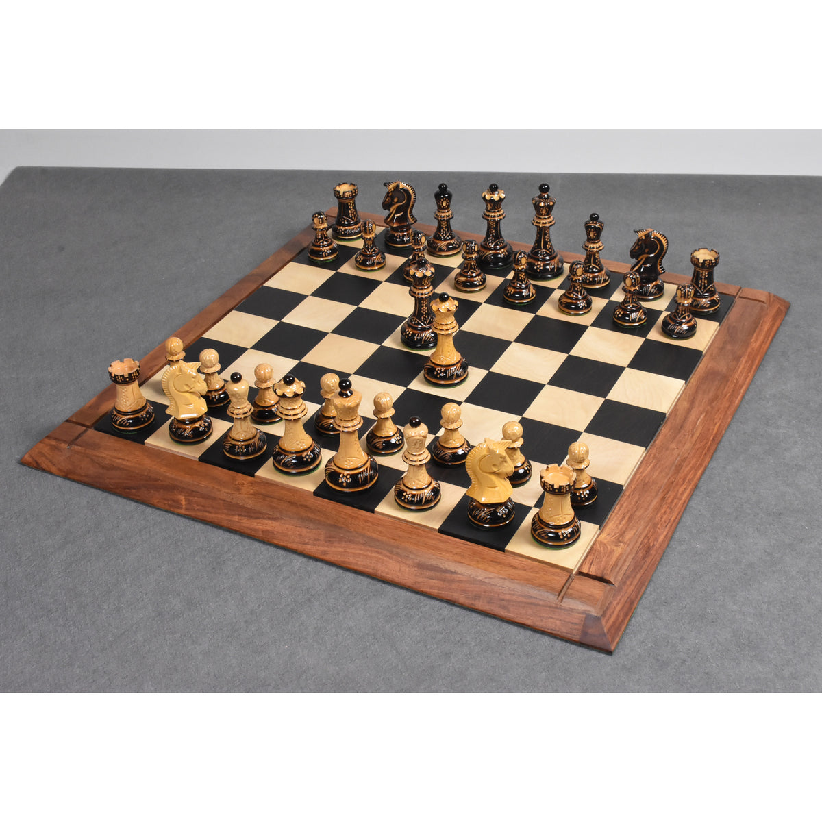 Complete 1970s Dubrovnik reproduction chess set arranged on a professional wooden chessboard.