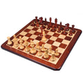 Complete 4.1" Chamfered Base Staunton chess pieces set up on a wooden chessboard.