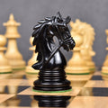 Detailed profile of a triple weighted ebony wood knight from the 4.3 inch Napoleon chess set.