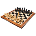Complete Arthur luxury Staunton chess set in ebony and boxwood on a wooden board.