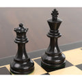 Close-up of an ebonised boxwood knight and rook from the Reykjavik Series Staunton chess set on a board.