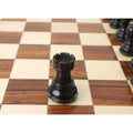Weighted ebonised boxwood rook piece from the 2.6 inch Russian Zagreb series on a checkered board.