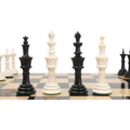 Turkish Tower pre-Staunton chess set pieces placed on a chessboard