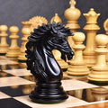 Detailed side profile of a handcrafted ebony Mogul Staunton knight chess piece.