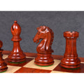 Detailed view of the beautifully carved Bud Rosewood bishop, knight, and rook from the 3.9" Craftsman Staunton chess set.