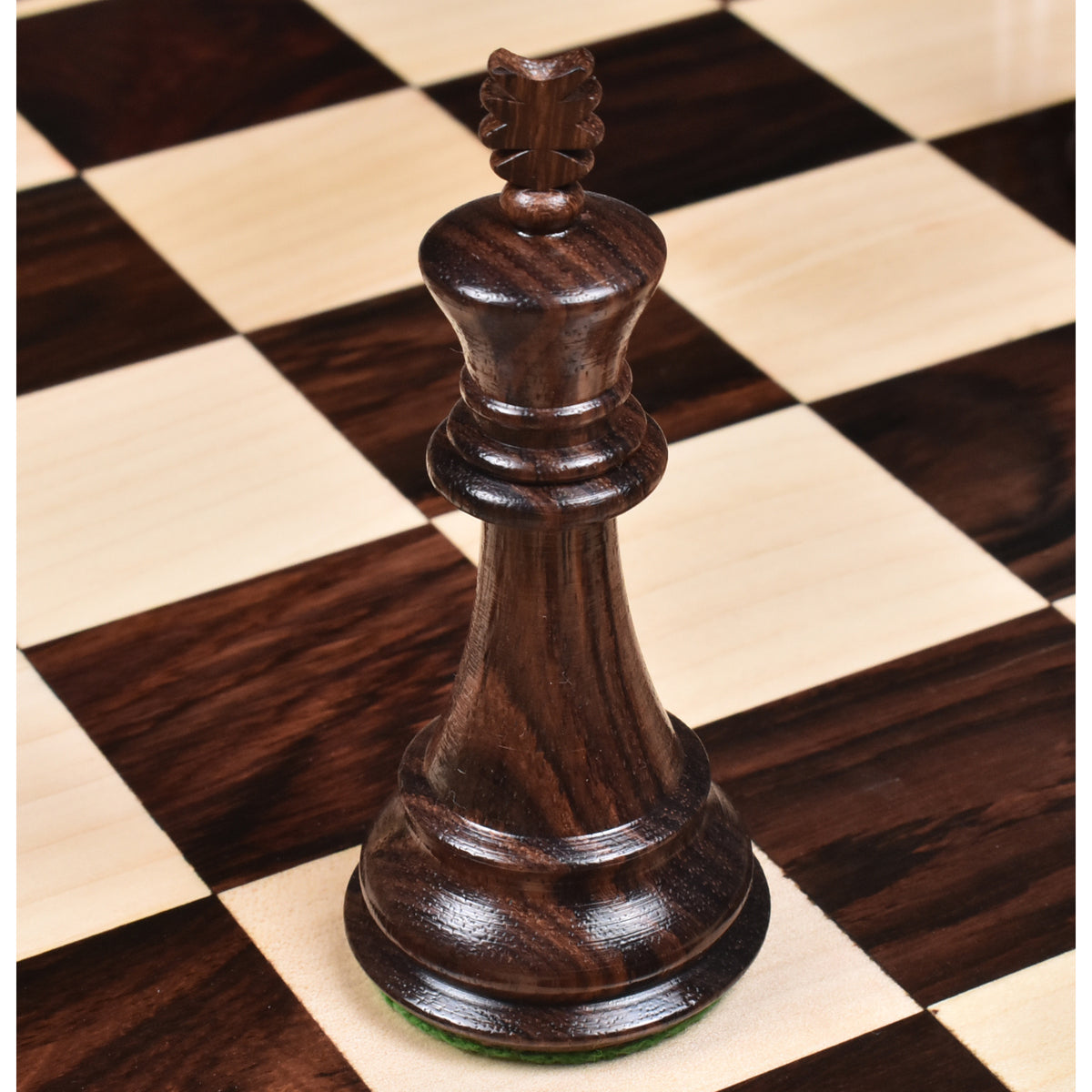 Detailed macro view of the premium double weighted rosewood king from the Majestic Series Staunton set.
