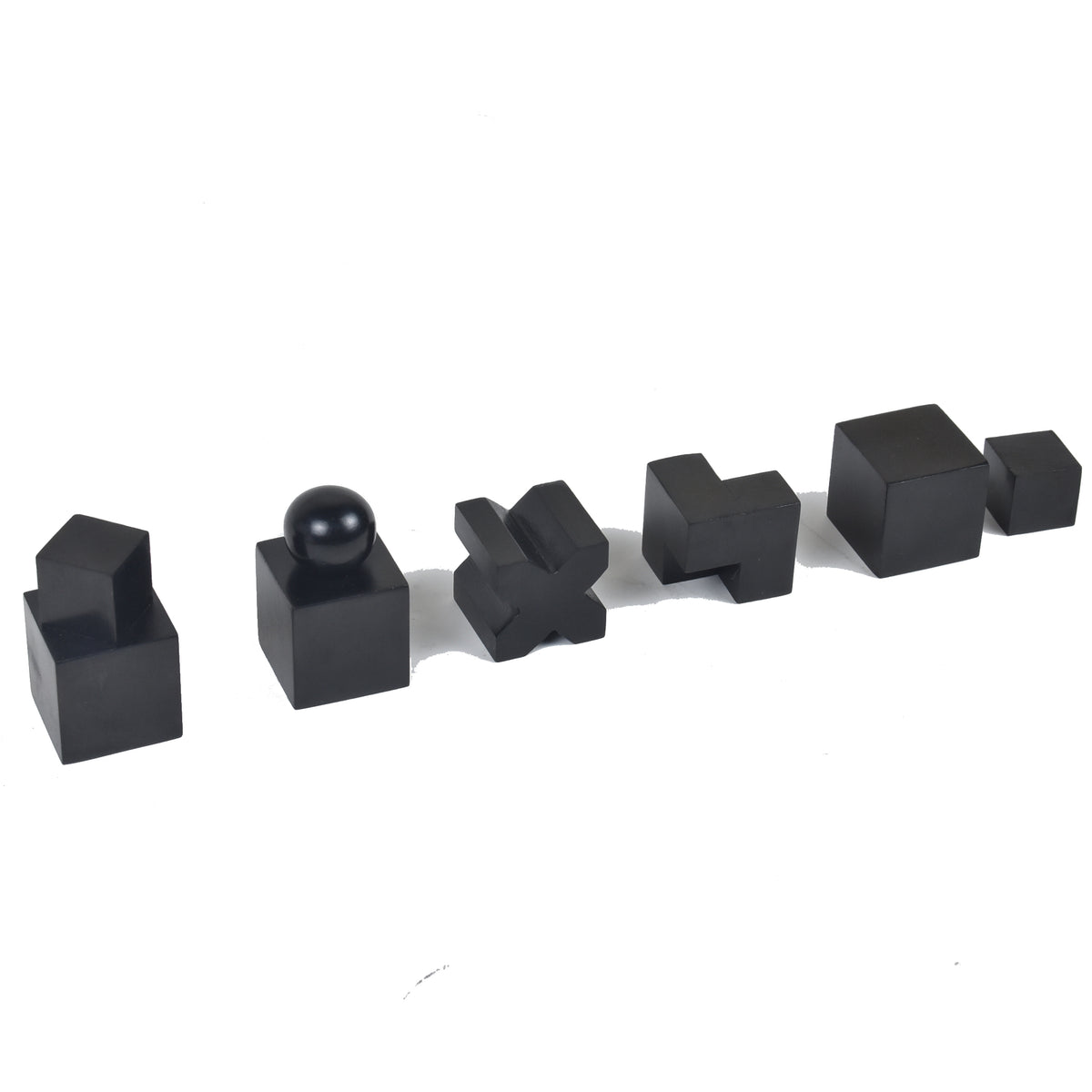 Perspective view of ebonised boxwood Bauhaus abstract chess pieces.
