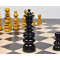 Detailed close-up of an ebony wood queen piece from the Calvert St. George chess set.