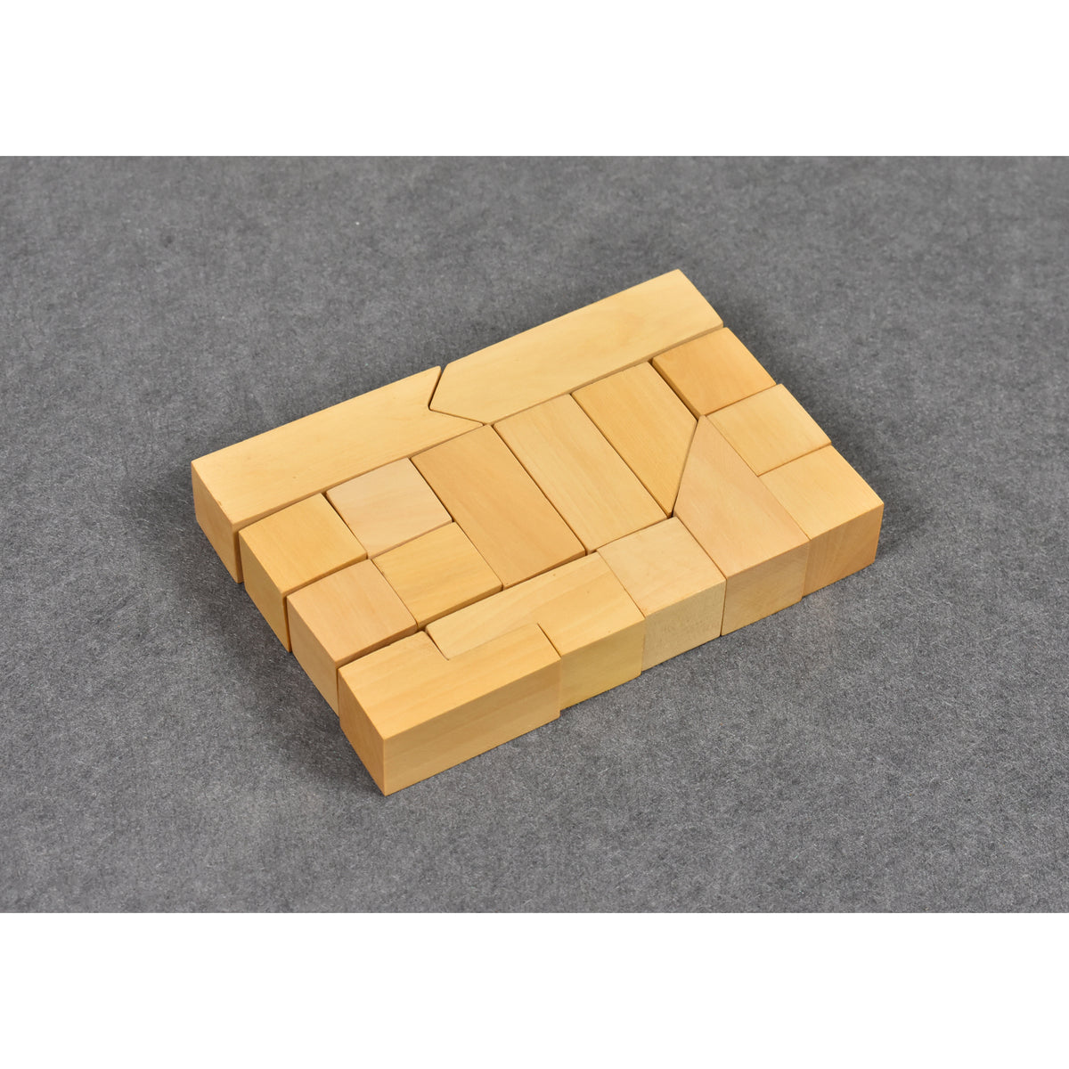 Compact cluster of black ebonised boxwood abstract pieces.