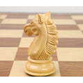 Close-up of a premium boxwood Alban Knight Staunton chess piece knight on a board.