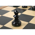 A black ebonized boxwood W.T. Pinney Staunton pawn positioned on a chessboard.