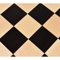 Macro shot of the premium wood grains on a 55 mm square borderless chess board surface.